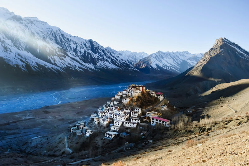Key Monastery on a hill above the Spiti river near Kaza, with snow peaks behind